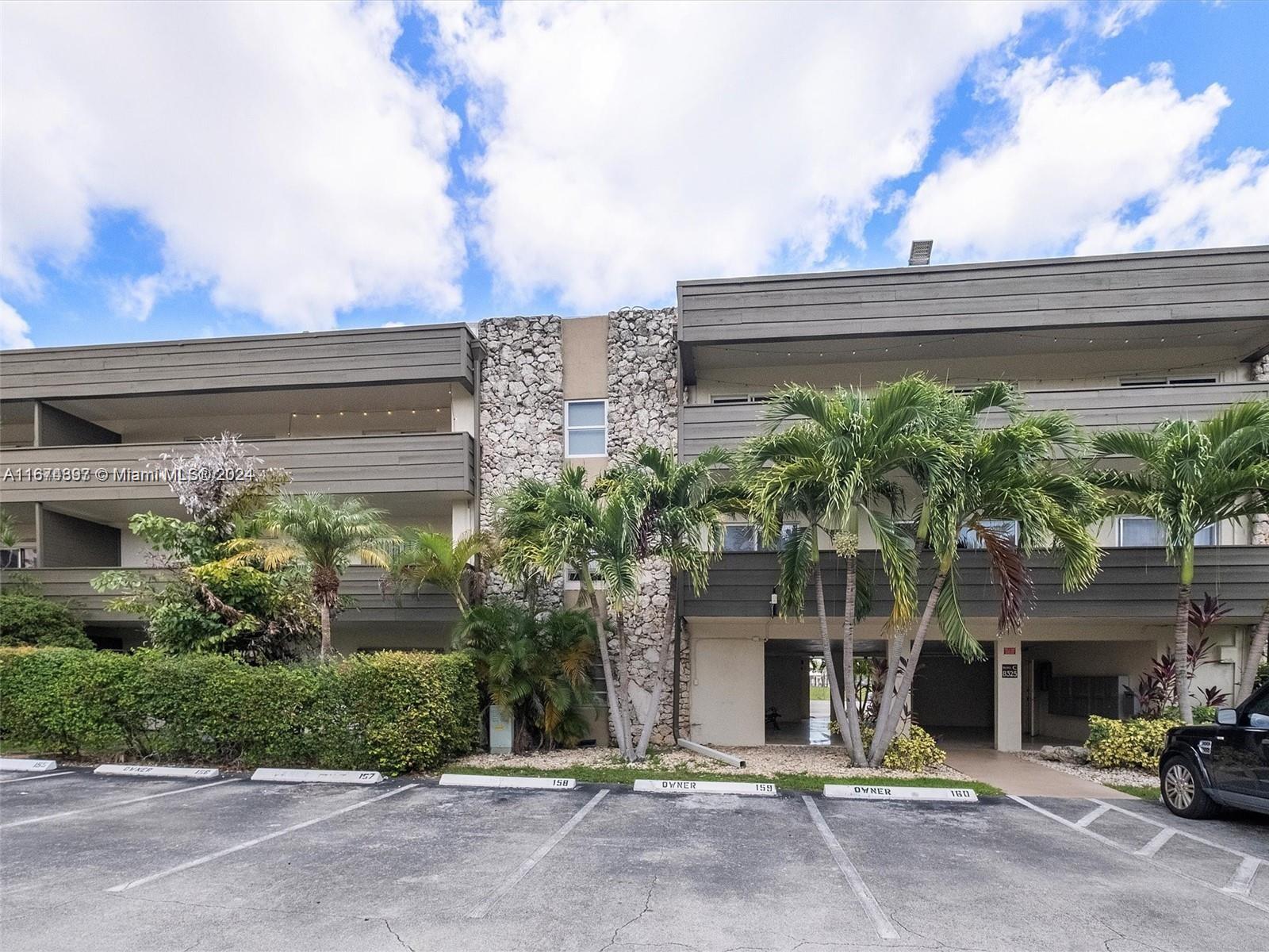 8335 Southwest 72nd Avenue, Unit 312D Miami, FL 33143 - Photo 36 of 45 a view of a building with a street