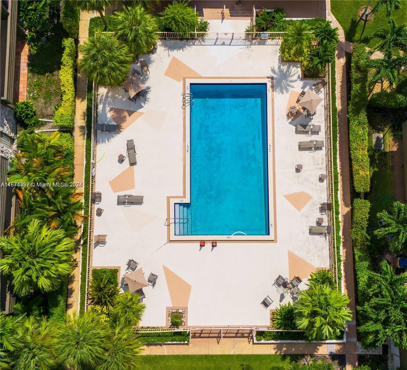 8335 Southwest 72nd Avenue, Unit 312D Miami, FL 33143 - Photo 39 of 45 an aerial view of a house with a yard