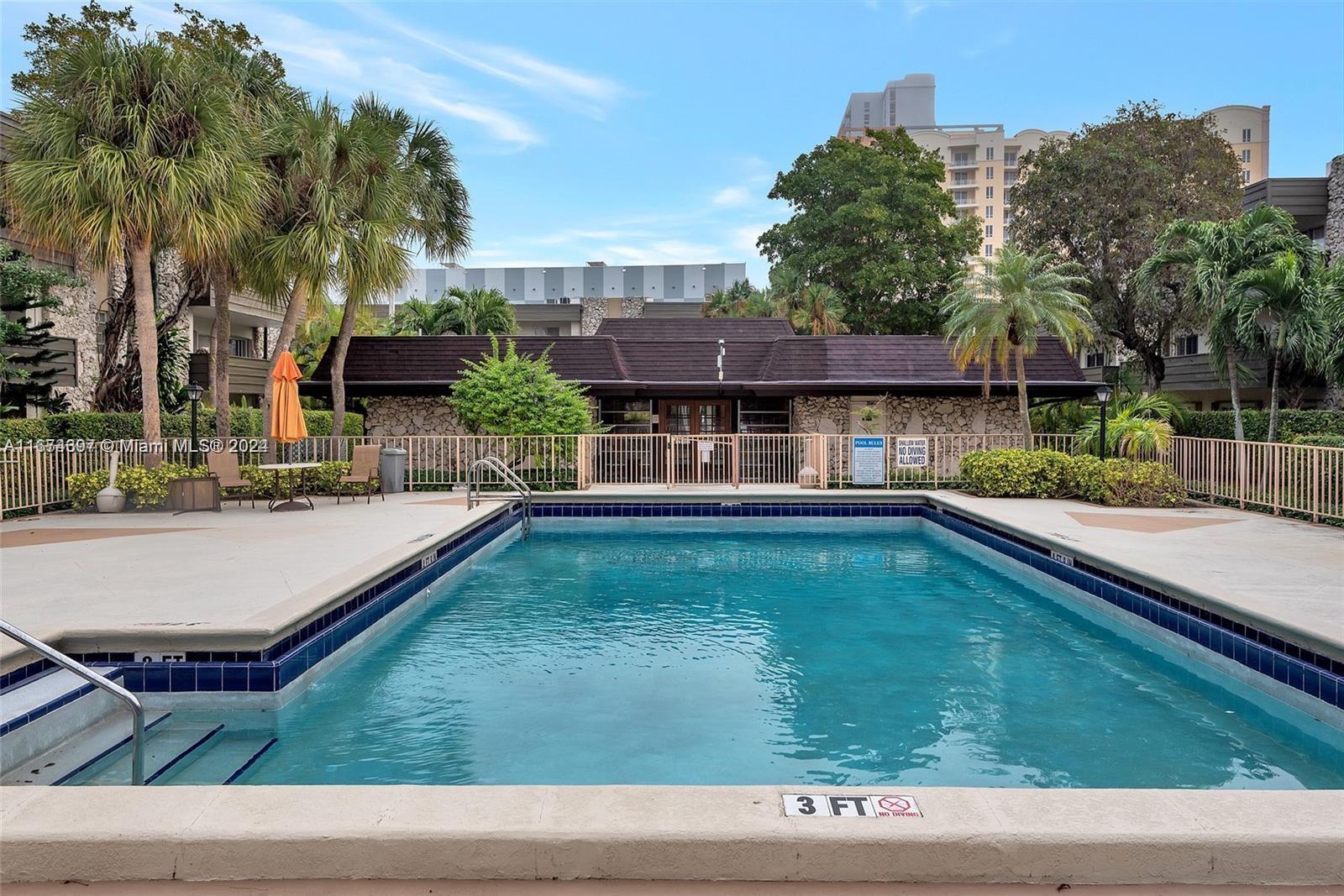 8335 Southwest 72nd Avenue, Unit 312D Miami, FL 33143 - Photo 40 of 45 a view of house with swimming pool