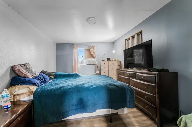a bathroom with a sink toilet and a mirror