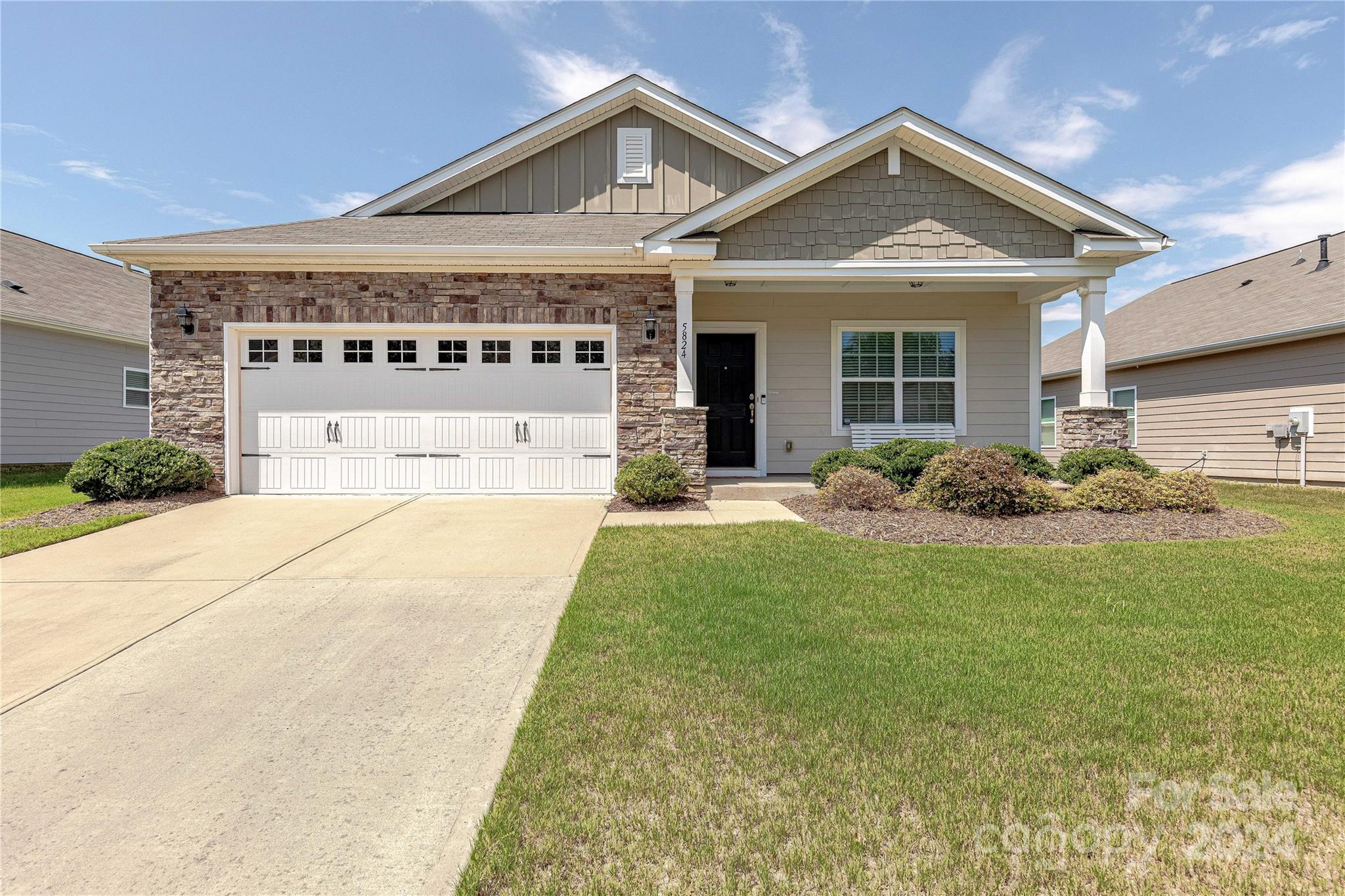 a view of a house with garden
