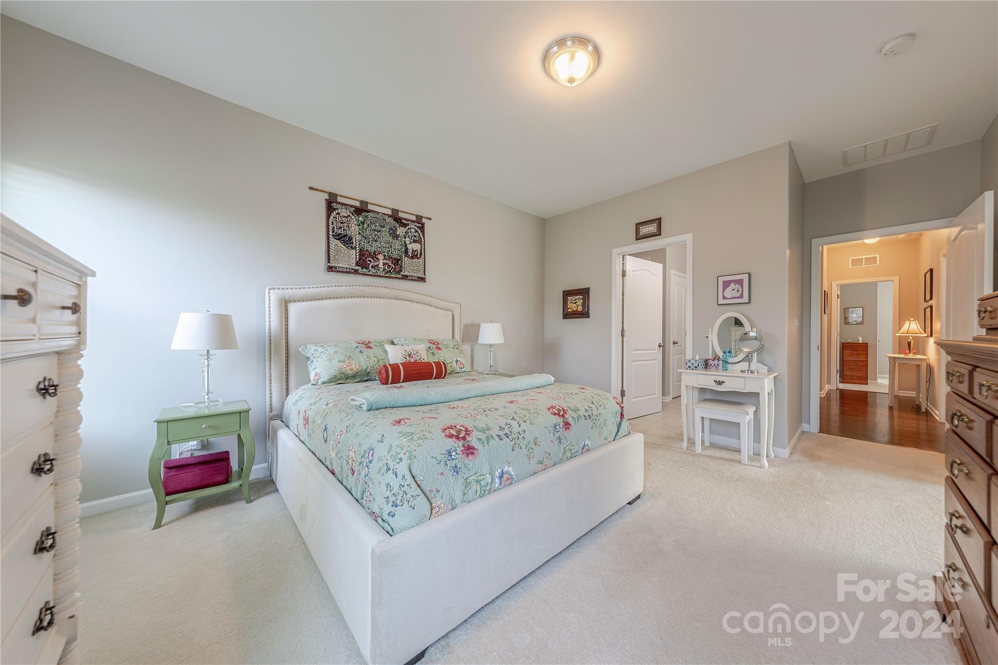 5824 Eleanor Rigby Road Charlotte, NC 28278 - Photo 19 of 34 a bedroom with a bed and a walk in closet