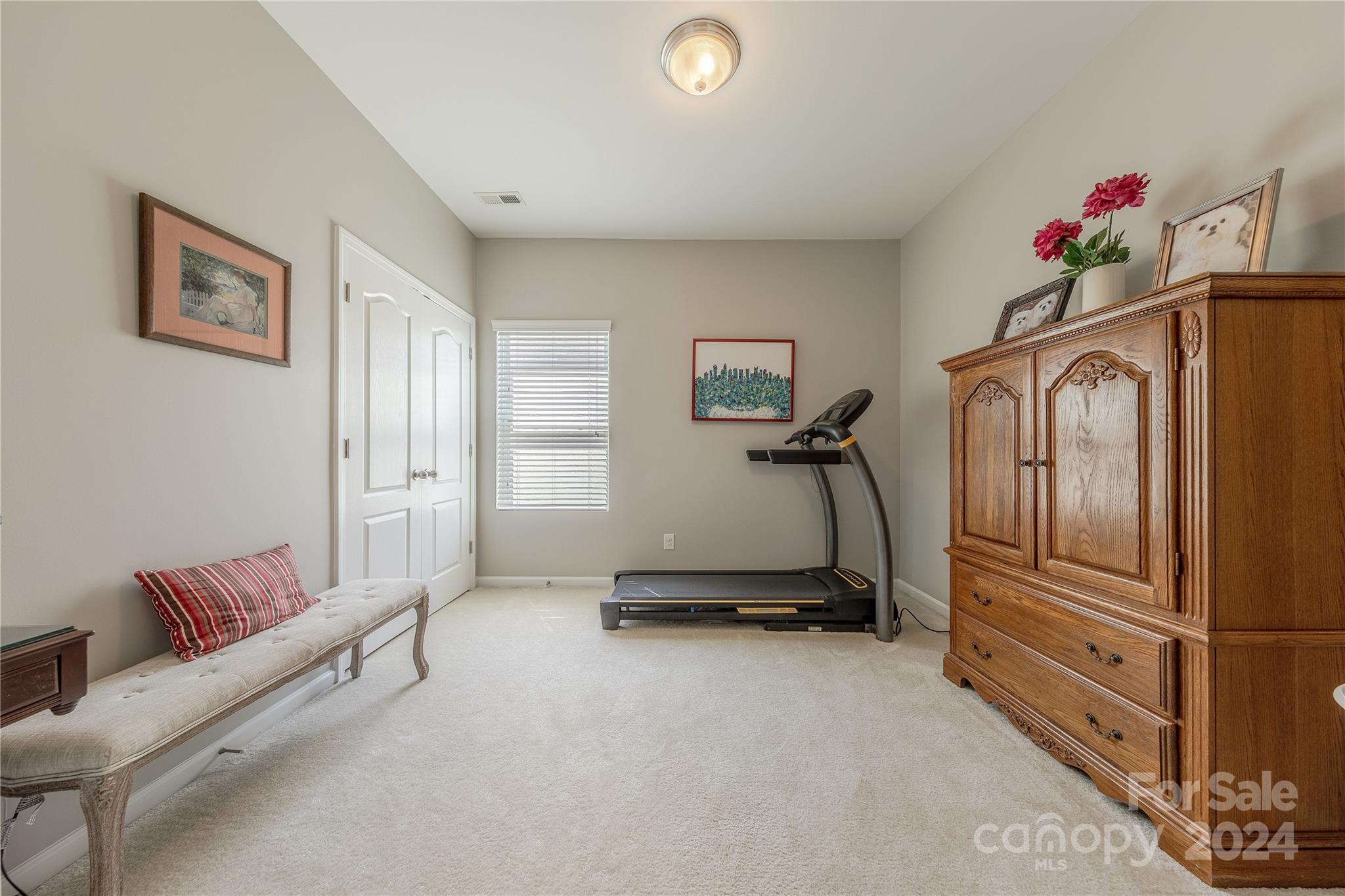 5824 Eleanor Rigby Road Charlotte, NC 28278 - Photo 23 of 34 a view of a room with gym equipment