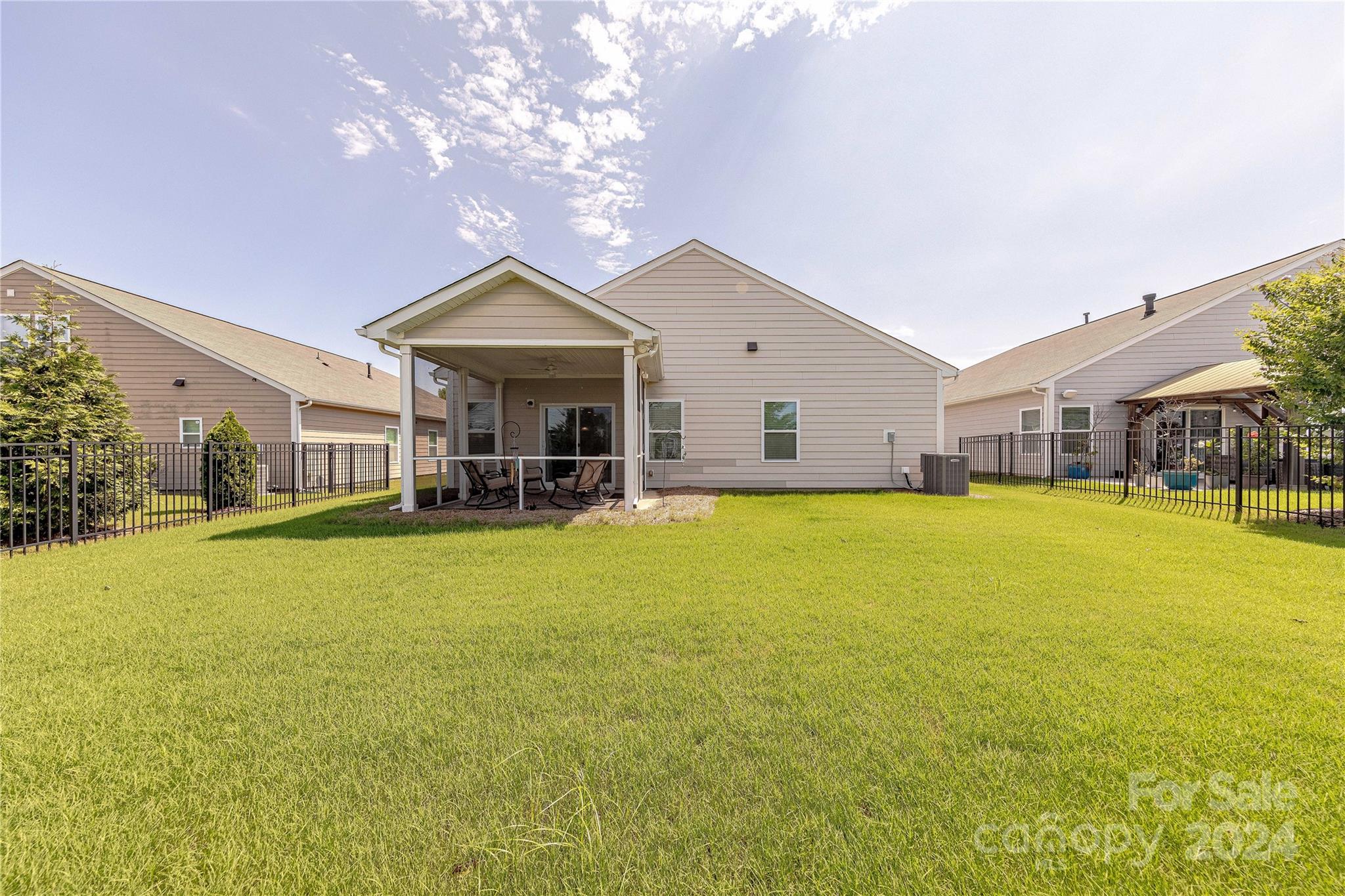 5824 Eleanor Rigby Road Charlotte, NC 28278 - Photo 32 of 34 a view of a house with swimming pool and porch