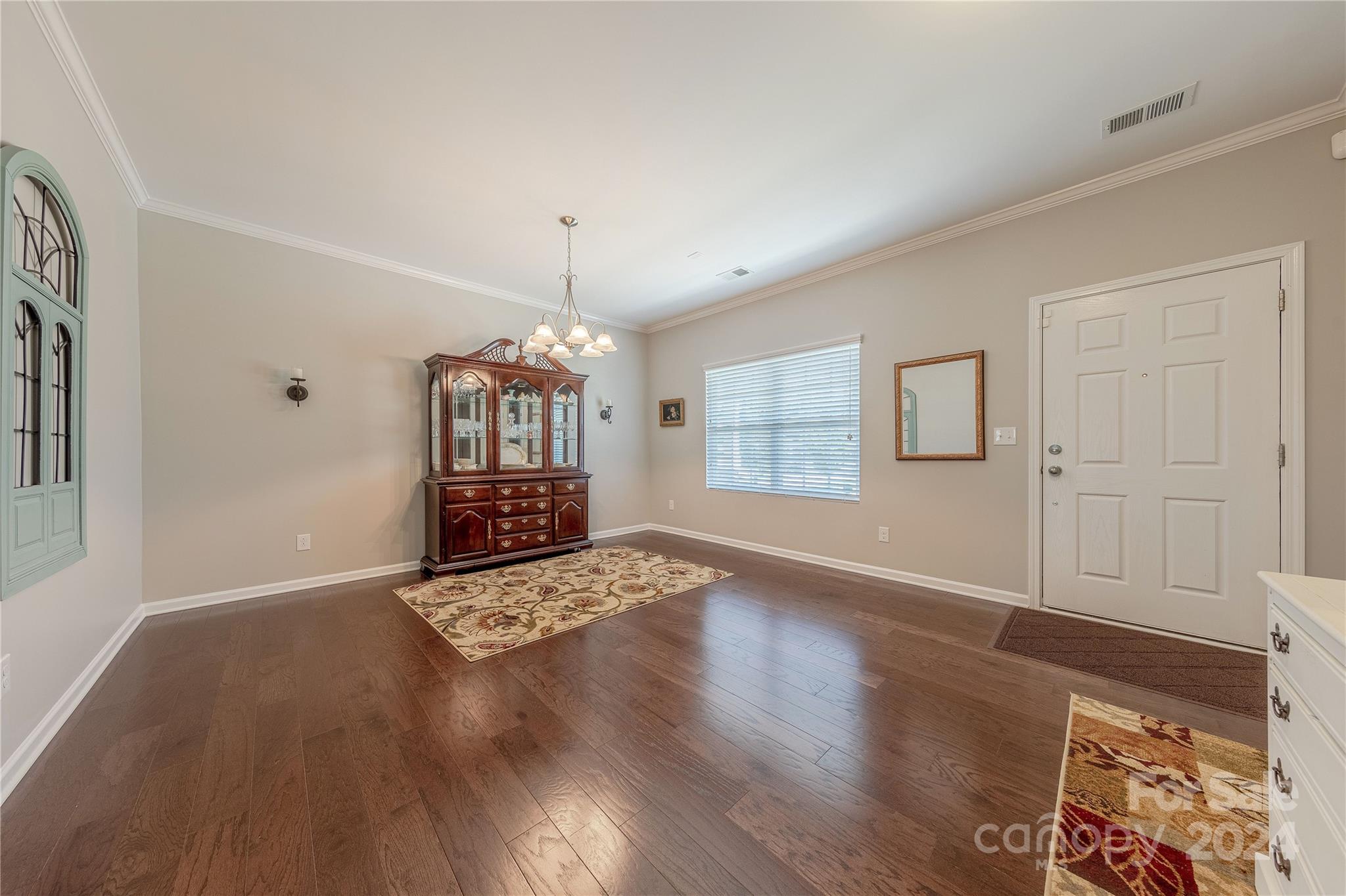 5824 Eleanor Rigby Road Charlotte, NC 28278 - Photo 5 of 34 a view of a livingroom with wooden floor and window
