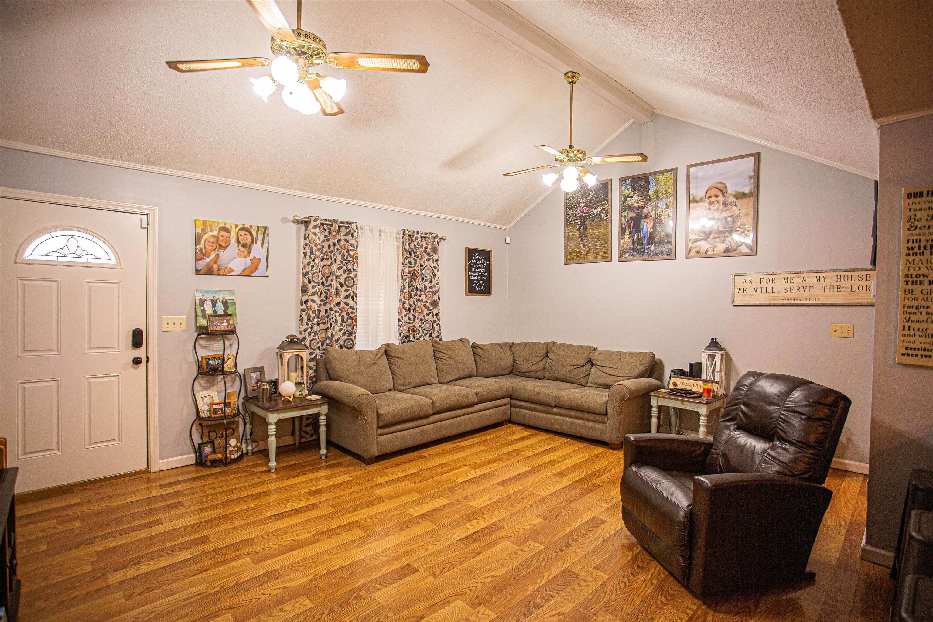 370 Dr Lewis Road Ripley, TN 38063 - Photo 3 of 25 a living room with furniture and wooden floor