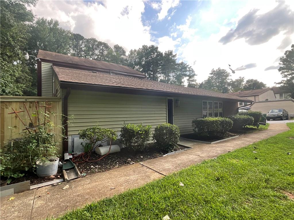 3155 Tangerine Court, Unit 3155 Decatur, GA 30034 - Photo 23 of 24 a view of backyard with seating space and wooden fence