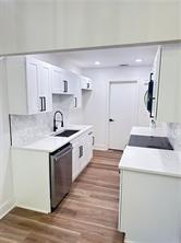 3155 Tangerine Court, Unit 3155 Decatur, GA 30034 - Photo 5 of 24 a view of a kitchen with sink and wooden floor