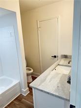 3155 Tangerine Court, Unit 3155 Decatur, GA 30034 - Photo 8 of 24 a bathroom with a granite countertop sink toilet and shower