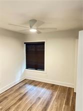 3155 Tangerine Court, Unit 3155 Decatur, GA 30034 - Photo 10 of 24 a view of an empty room with wooden floor and a window