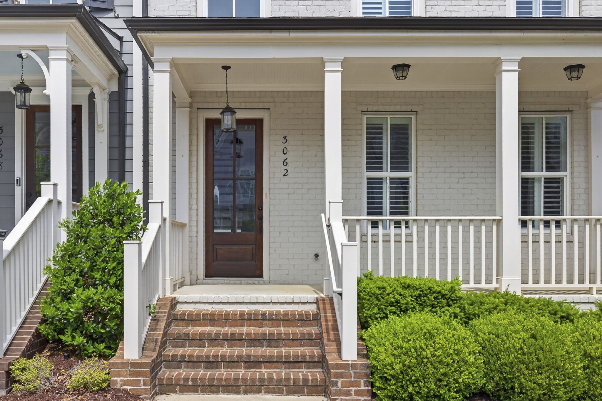 3062 Cheever Street Franklin, TN 37064 - Photo 4 of 51 a front view of a house with a garden