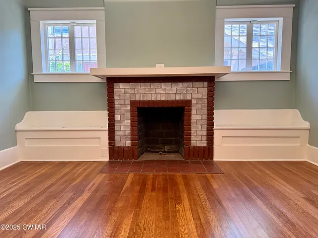 a living room with a fireplace
