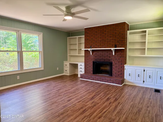 a living room with a fireplace