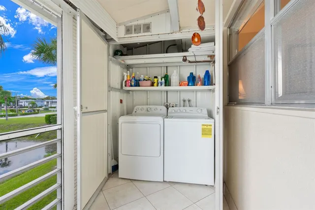 a utility room with dryer and washer