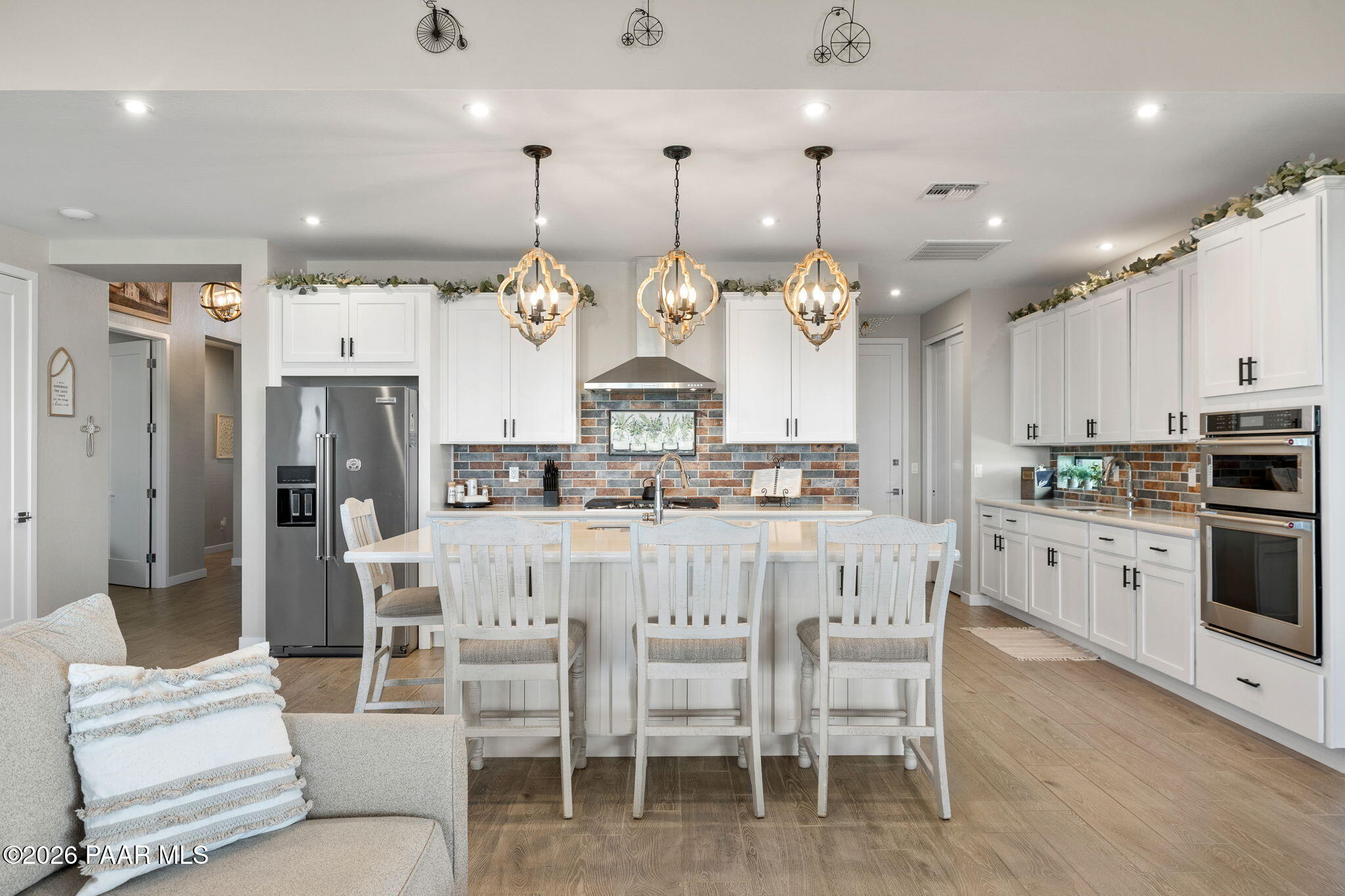 4882 North Yorkshire Loop Prescott Valley, AZ 86314 - Photo 13 of 28 a large kitchen with a table and chairs