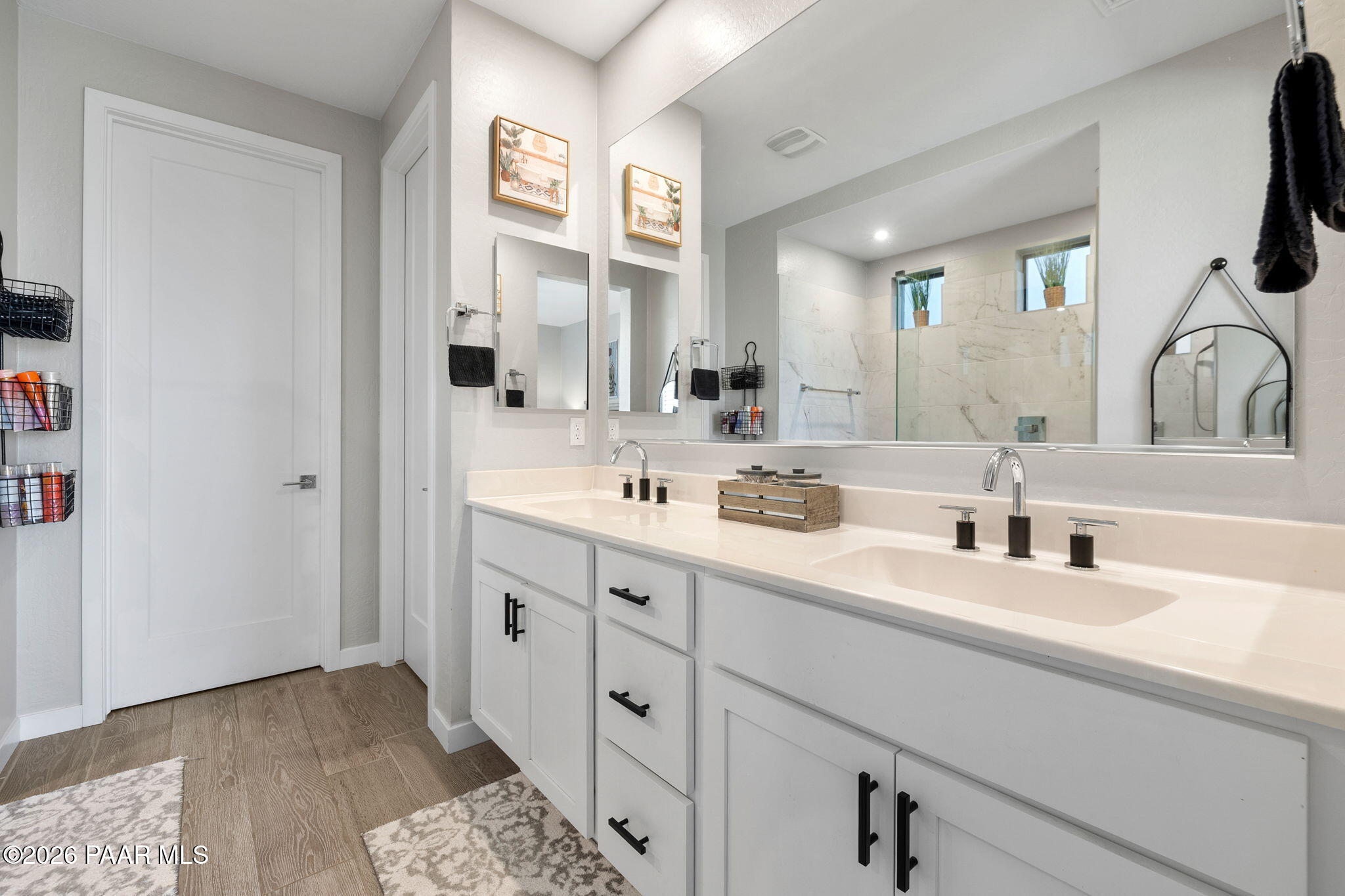4882 North Yorkshire Loop Prescott Valley, AZ 86314 - Photo 20 of 28 a bathroom with double vanity a mirror and a sink