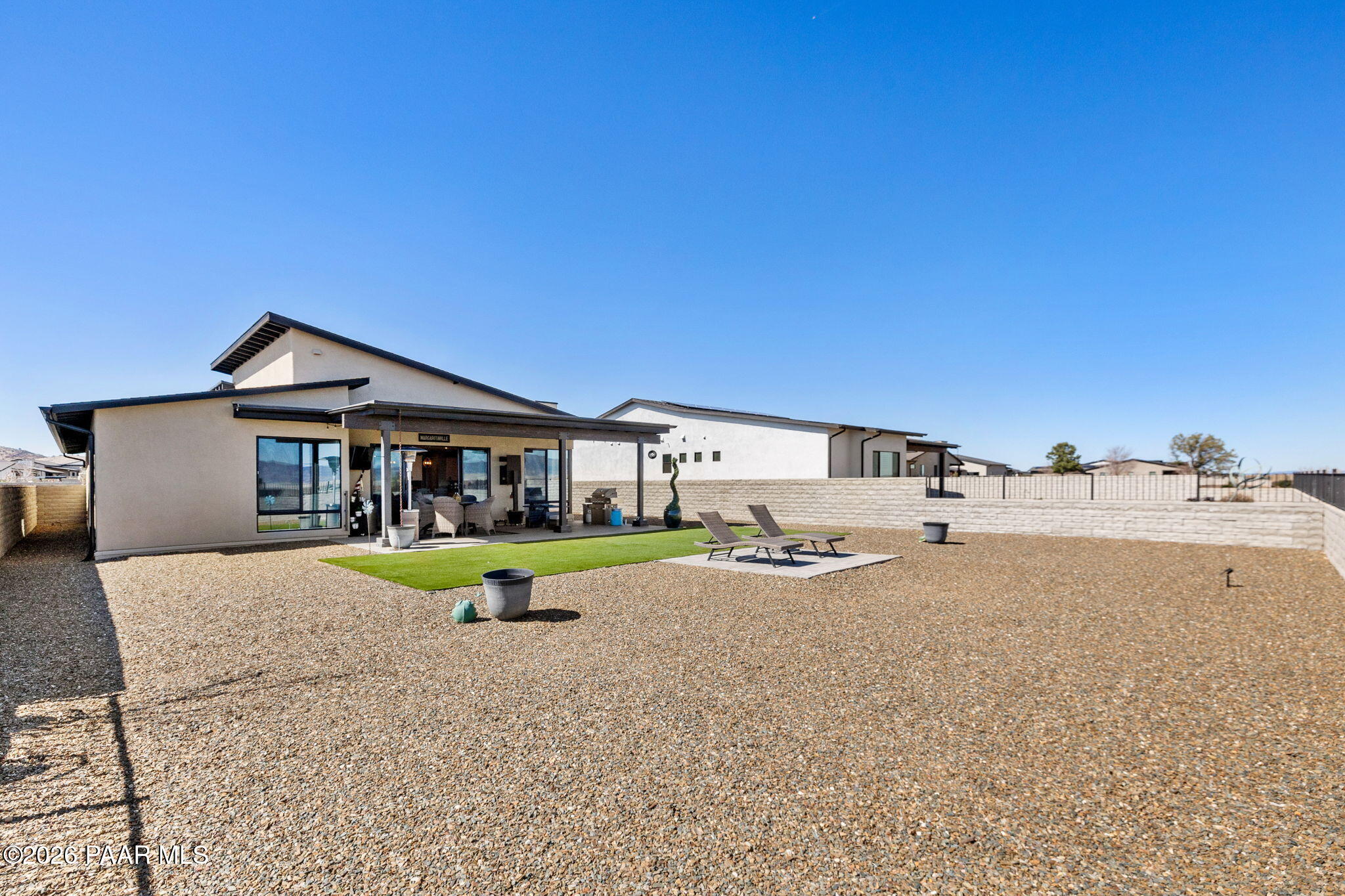 4882 North Yorkshire Loop Prescott Valley, AZ 86314 - Photo 24 of 28 a front view of a house with a yard
