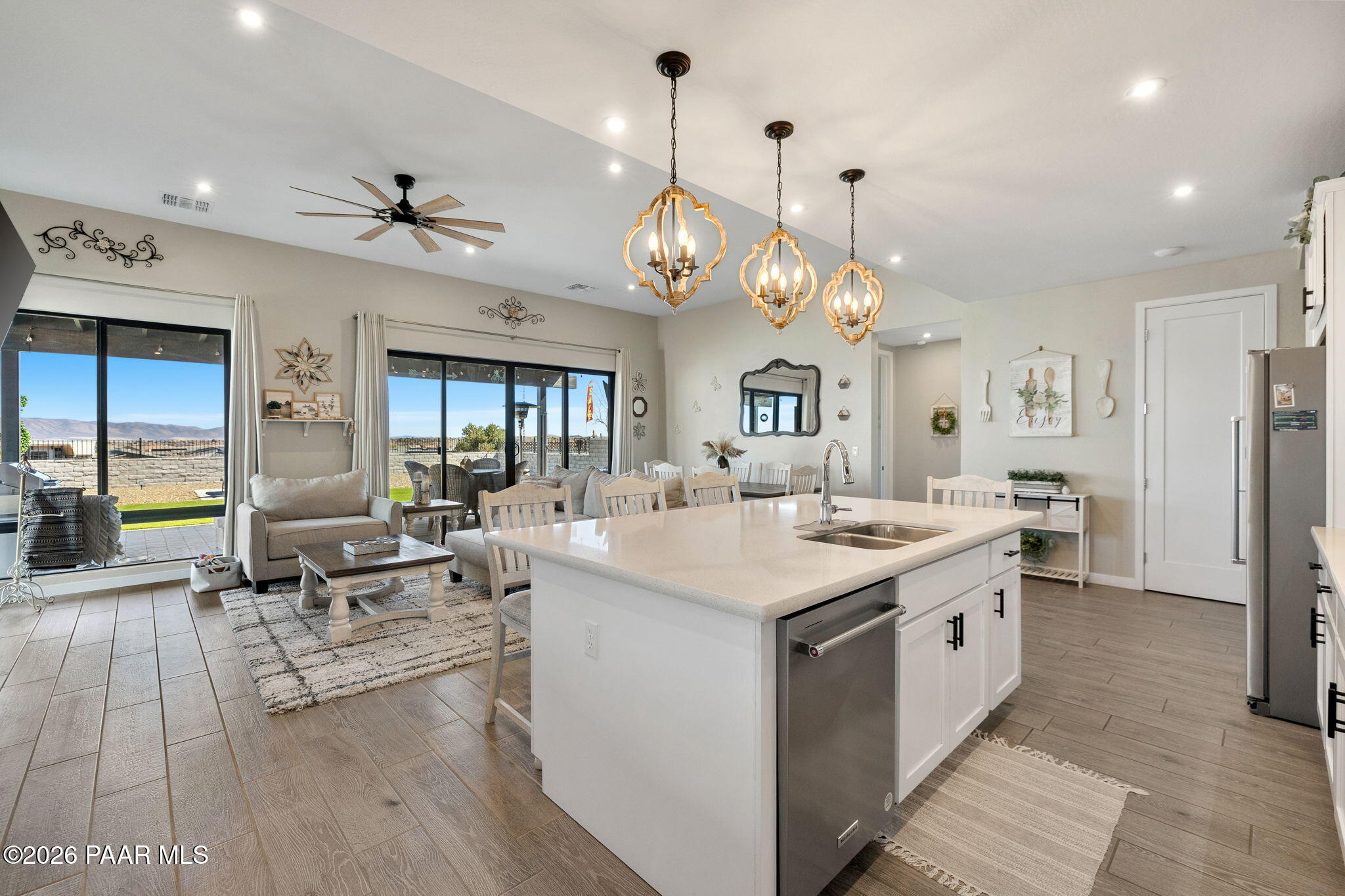 4882 North Yorkshire Loop Prescott Valley, AZ 86314 - Photo 10 of 28 a very nice looking kitchen with granite countertop a stove oven a stove a dining table and chairs