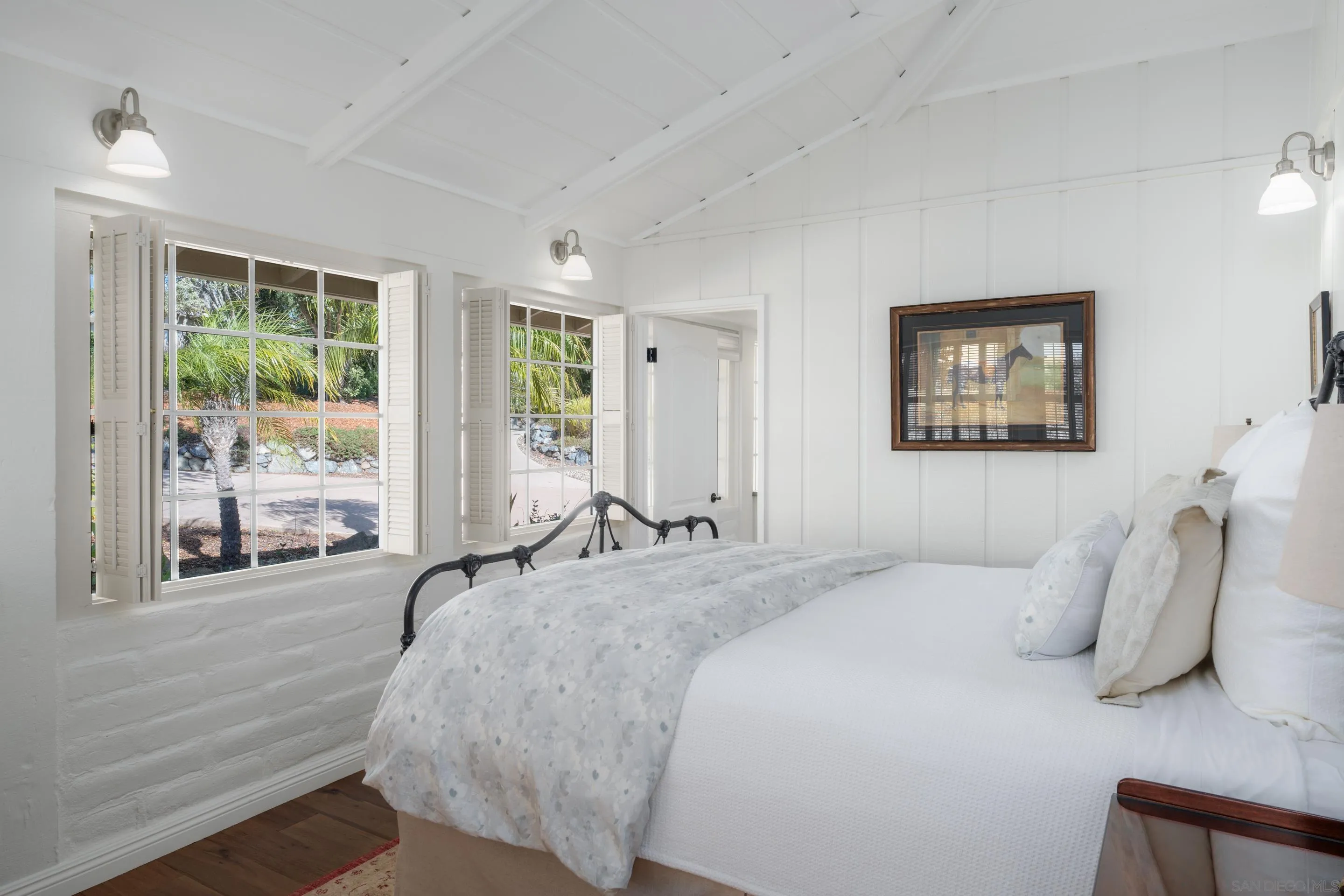 5327 La Glorieta Rancho Santa Fe, CA 92067 - Photo 13 of 34 a spacious bedroom with a bed and glass window