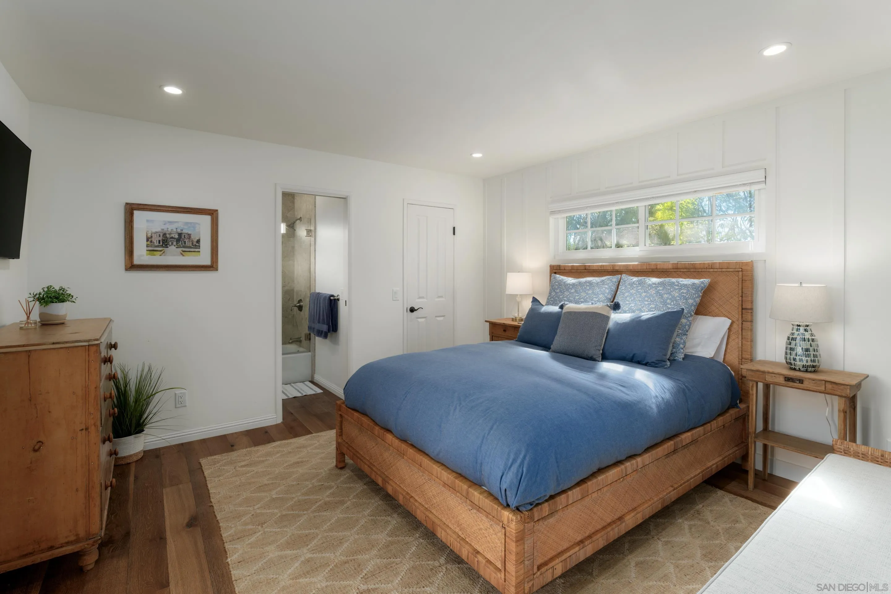 5327 La Glorieta Rancho Santa Fe, CA 92067 - Photo 26 of 34 a bedroom with a bed and a potted plant