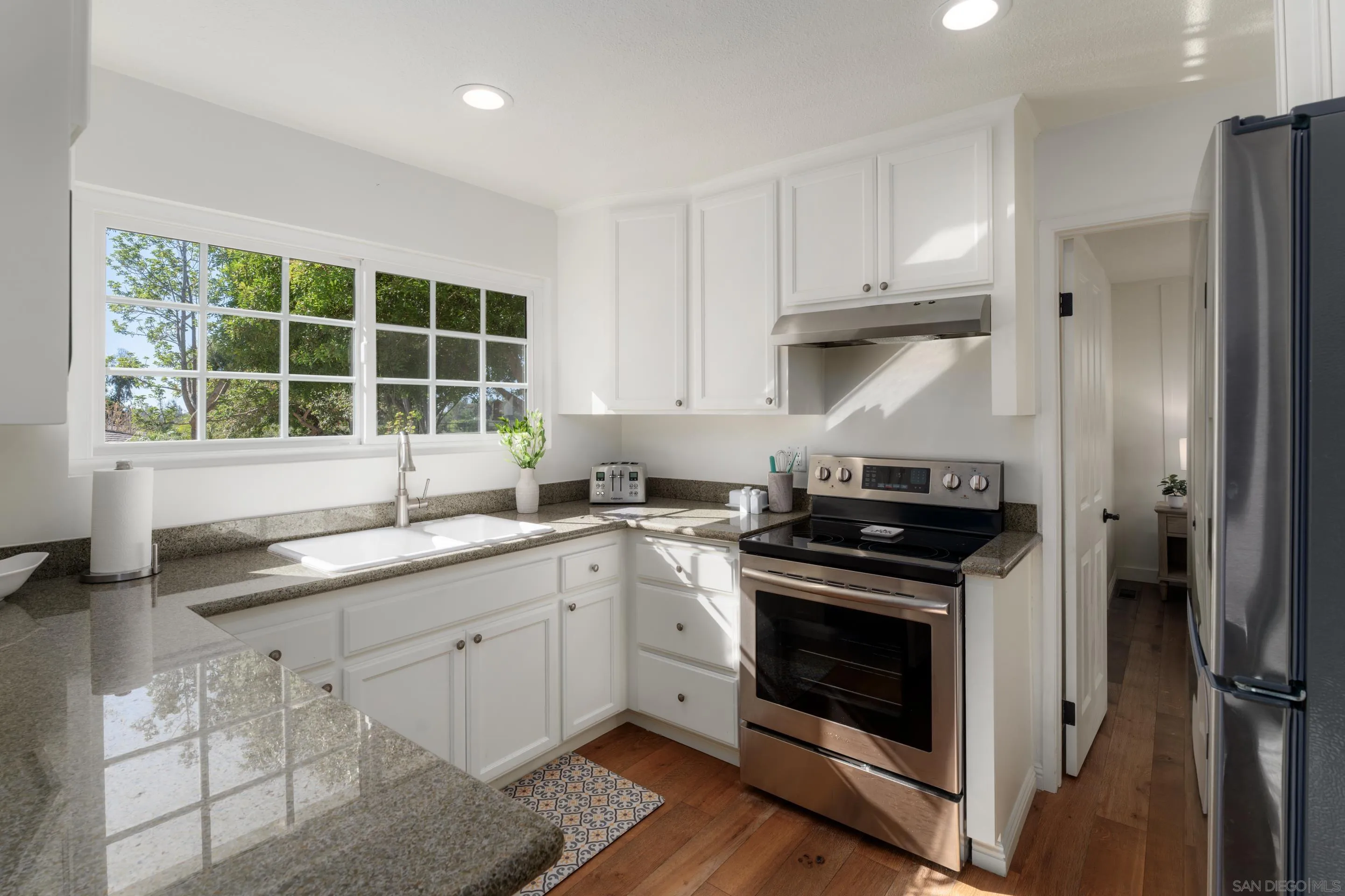 5327 La Glorieta Rancho Santa Fe, CA 92067 - Photo 27 of 34 a kitchen with a stove oven and sink