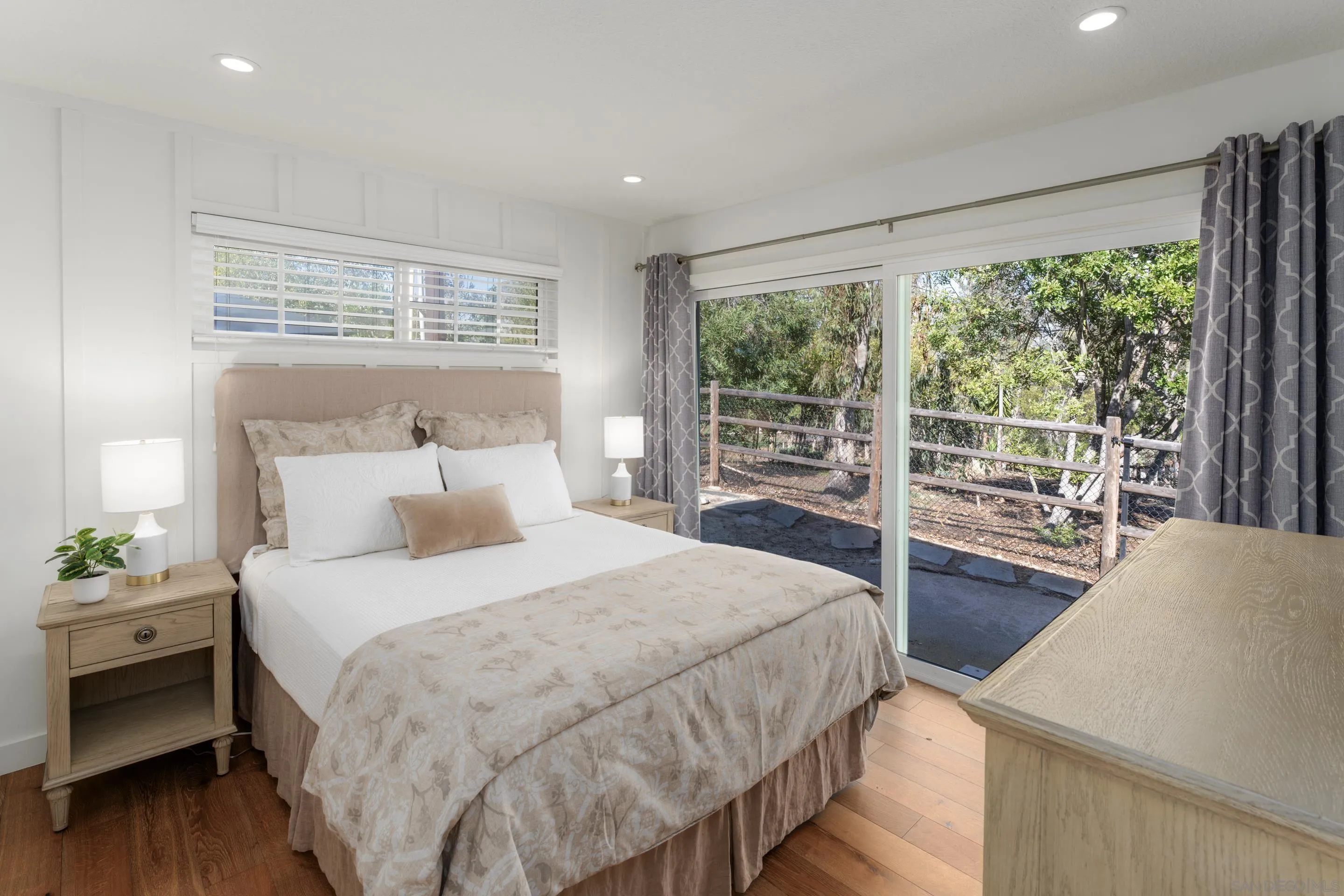 5327 La Glorieta Rancho Santa Fe, CA 92067 - Photo 28 of 34 a bedroom with a large bed and a large window