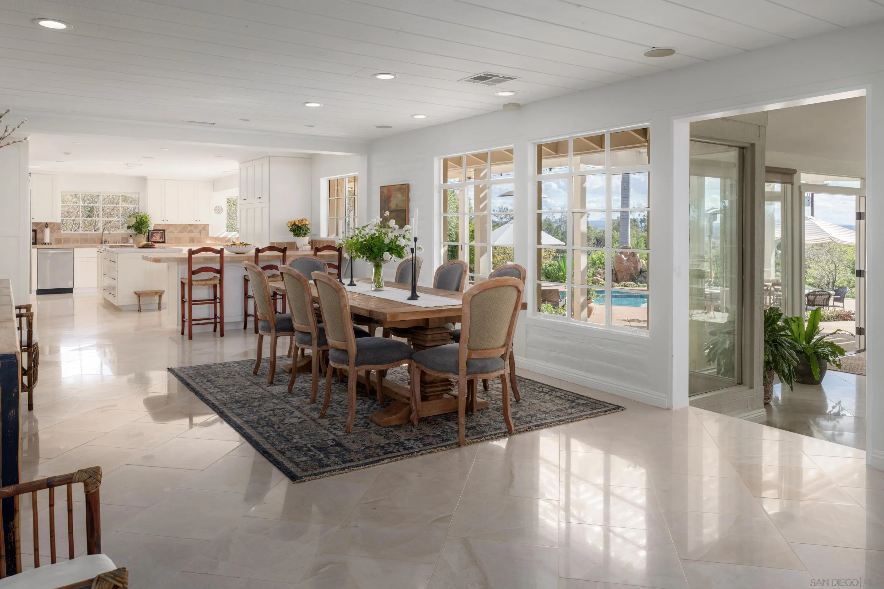 5327 La Glorieta Rancho Santa Fe, CA 92067 - Photo 9 of 34 a dining room with furniture window and wooden floor