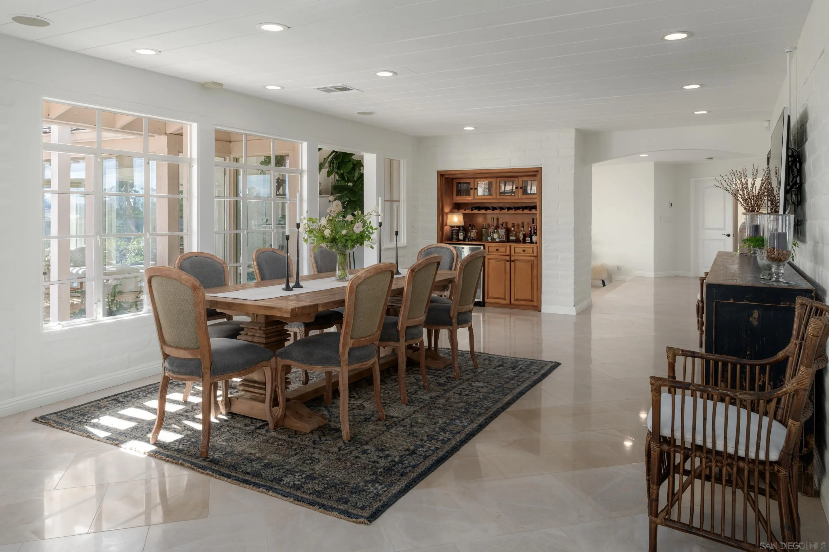 5327 La Glorieta Rancho Santa Fe, CA 92067 - Photo 10 of 34 a view of a dining room with furniture