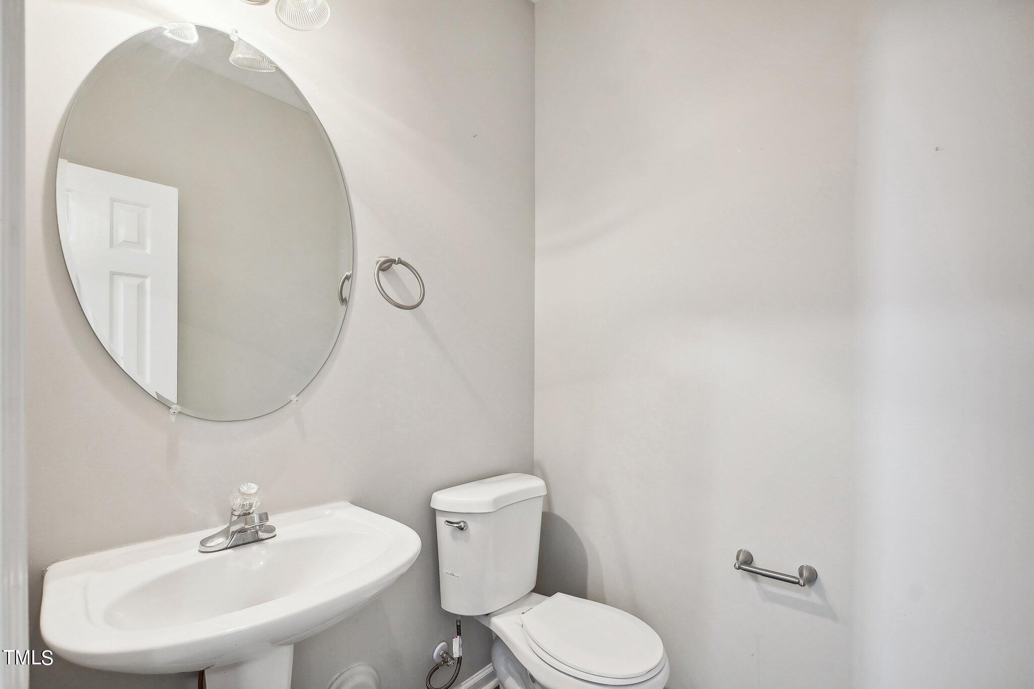 7005 Missionary Ridge Drive Raleigh, NC 27610 - Photo 13 of 27 Downstairs Guest Half Bath
