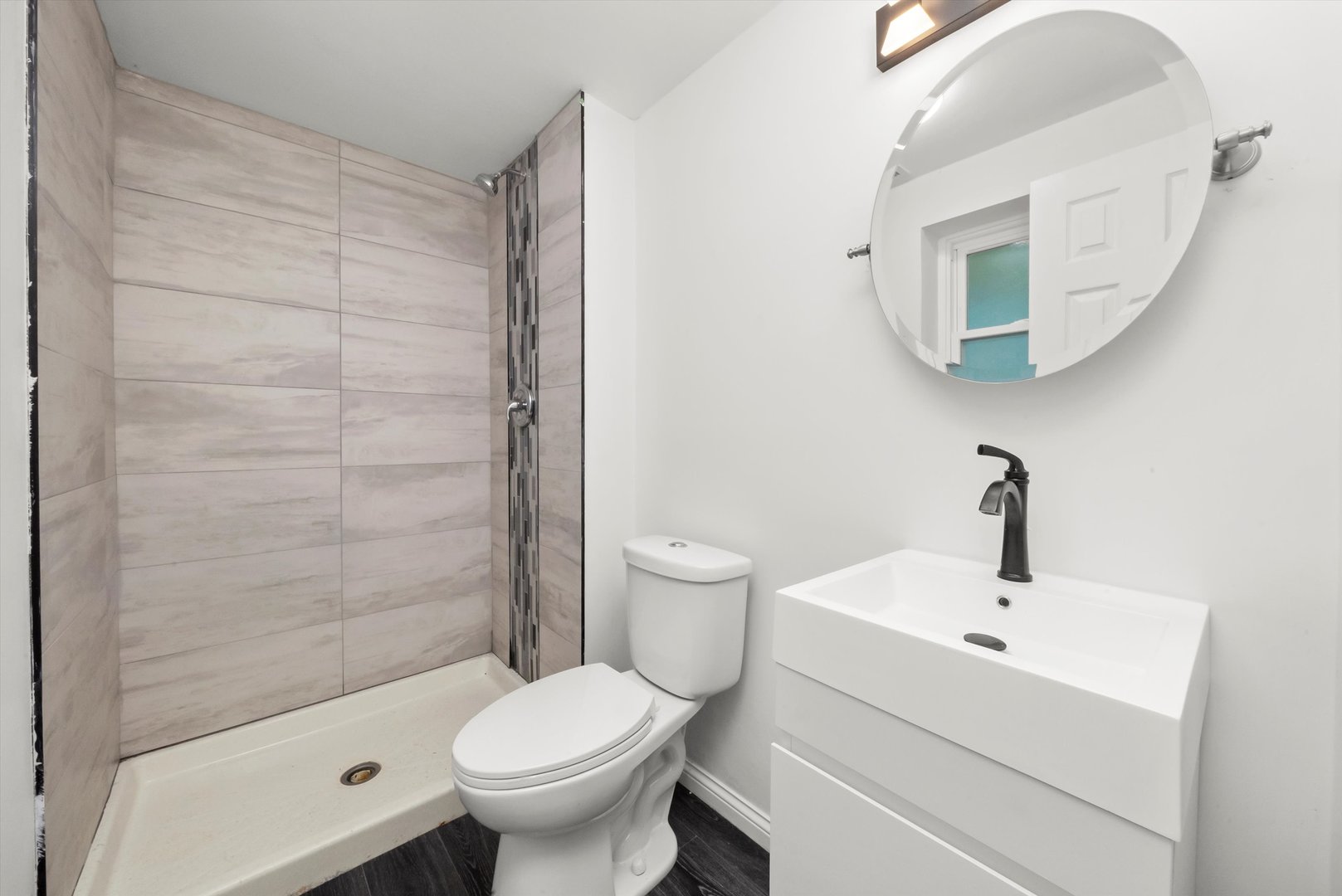 3619 West 163rd Street Markham, IL 60428 - Photo 28 of 40 a bathroom with a sink toilet and shower