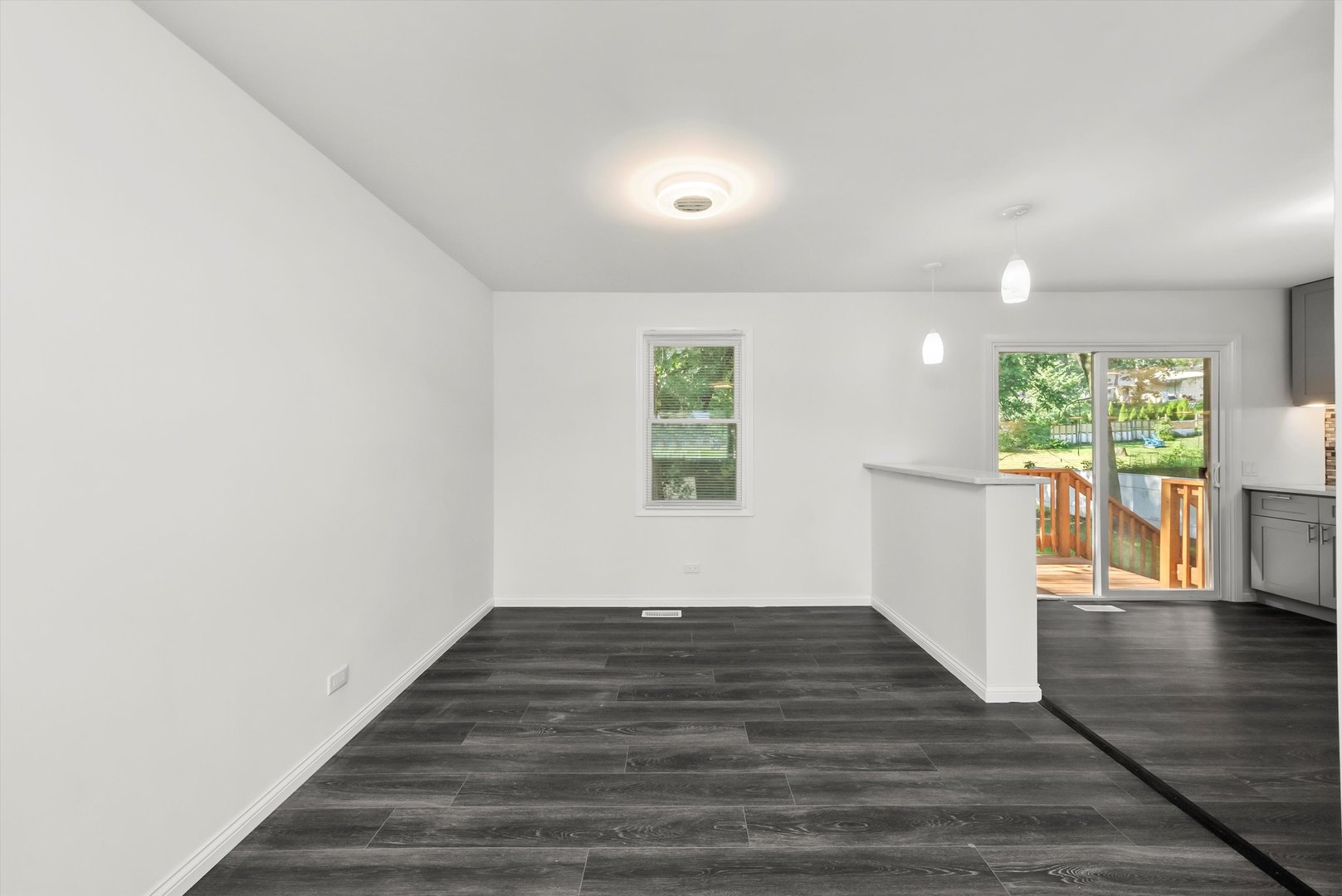 3619 West 163rd Street Markham, IL 60428 - Photo 5 of 40 a view of an empty room with wooden floor and a window