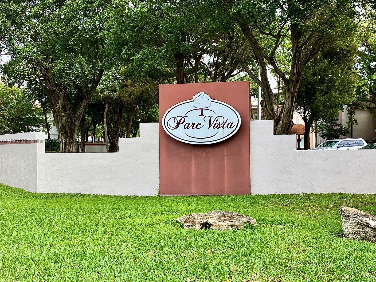 9201 Southwest 138th Place, Unit 9201 Miami, FL 33186 - Photo 16 of 20 a view of outdoor space and yard