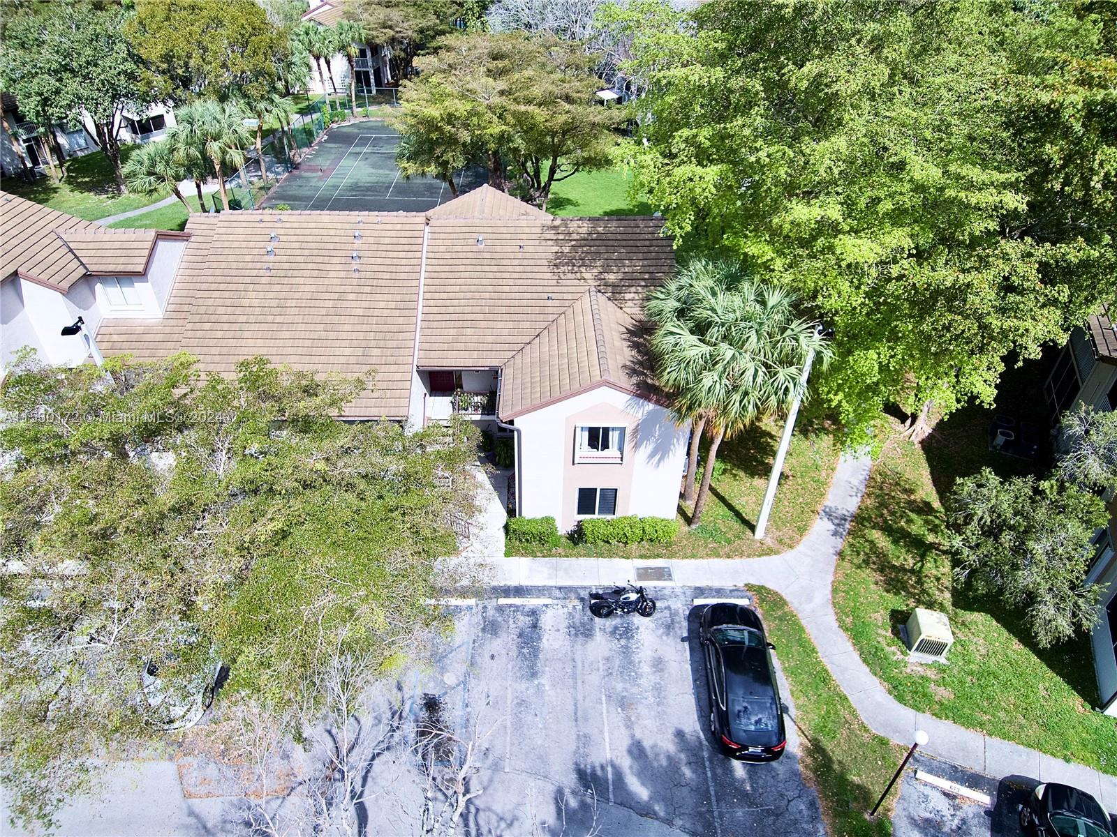 9201 Southwest 138th Place, Unit 9201 Miami, FL 33186 - Photo 18 of 20 an aerial view of a house
