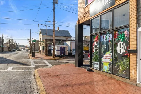 a view of street with shops