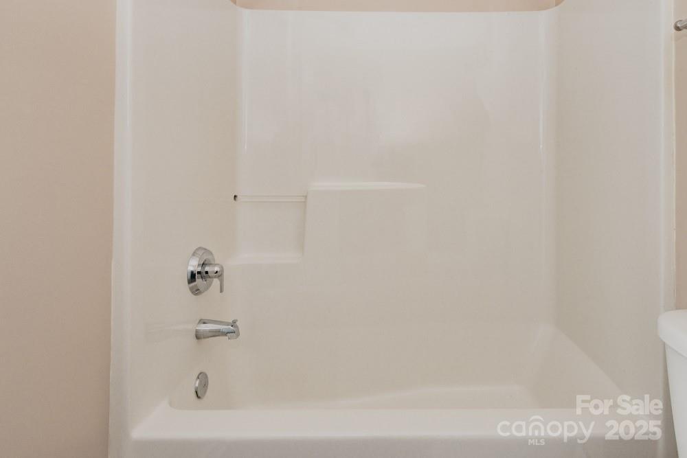 5622 Osprey Cove Drive Raleigh, NC 27604 - Photo 18 of 30 a close up of a bathtub