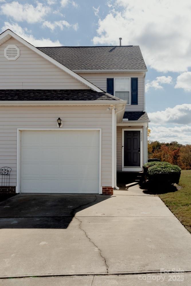 5622 Osprey Cove Drive Raleigh, NC 27604 - Photo 2 of 30 a front view of a house with a yard