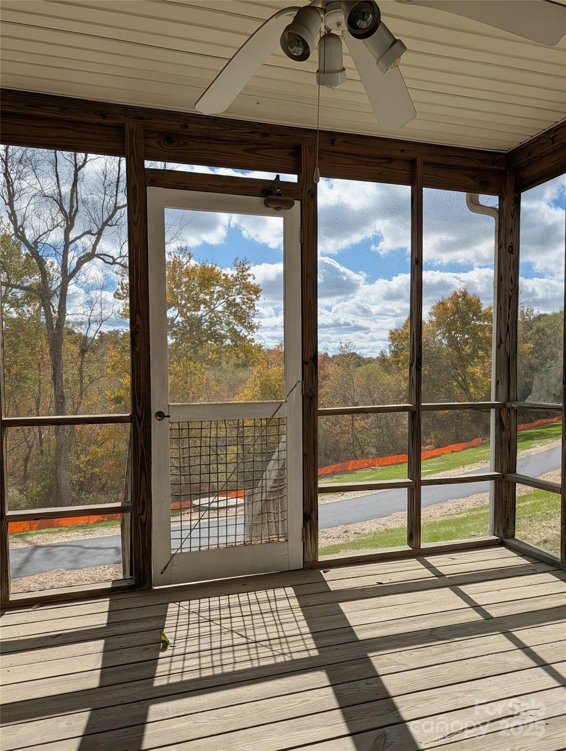 5622 Osprey Cove Drive Raleigh, NC 27604 - Photo 28 of 30 a view of a room with wooden floor and iron stairs