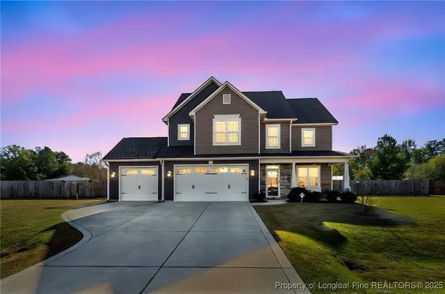 a front view of a house with swimming pool