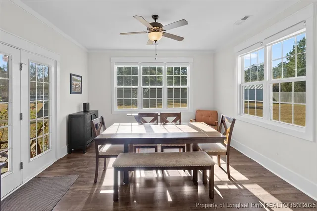 a view of a swimming pool with an outdoor space and seating area