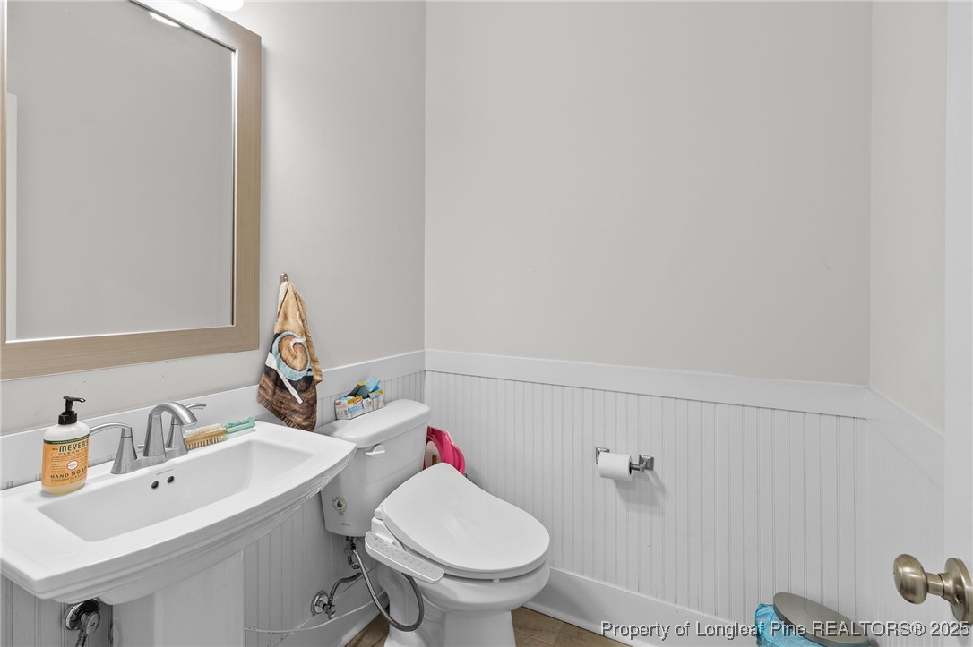 1423 Creekwood Road Hope Mills, NC 28348 - Photo 23 of 49 a bathroom with a sink and a toilet