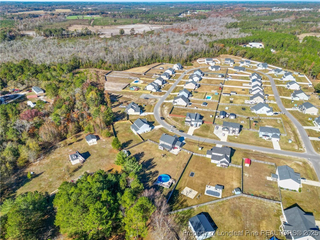 1423 Creekwood Road Hope Mills, NC 28348 - Photo 5 of 49 an aerial view of residential houses with outdoor space