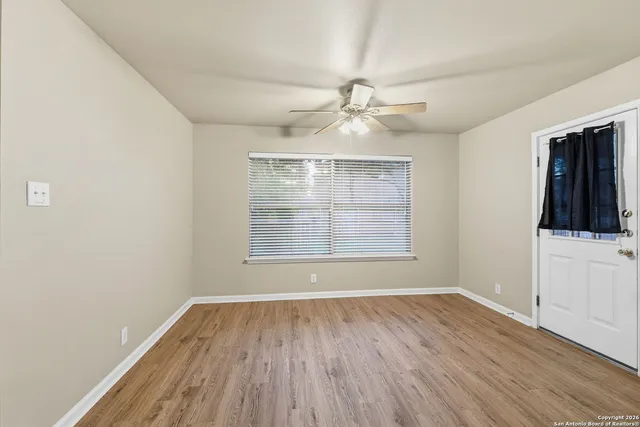 a kitchen with a sink and a refrigerator