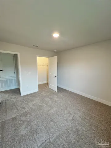 wooden floor and window in a room