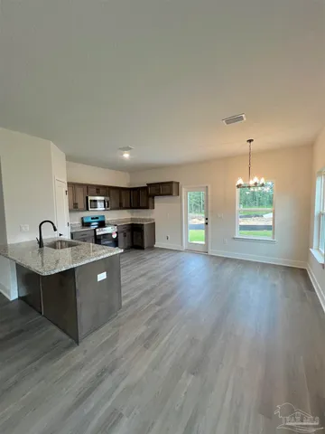 a view of a kitchen with a sink