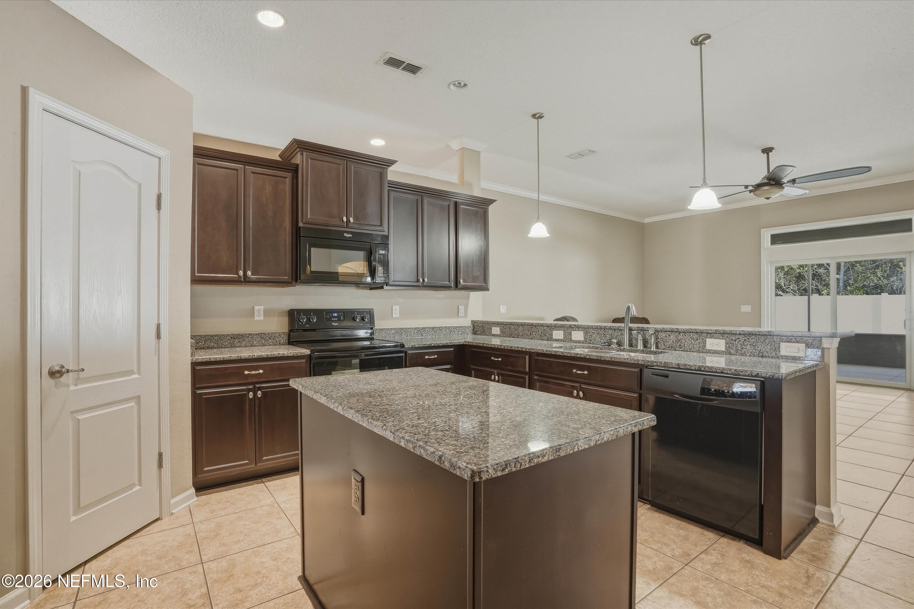 3908 Pipit Point Middleburg, FL 32068 - Photo 7 of 50 07-Kitchen