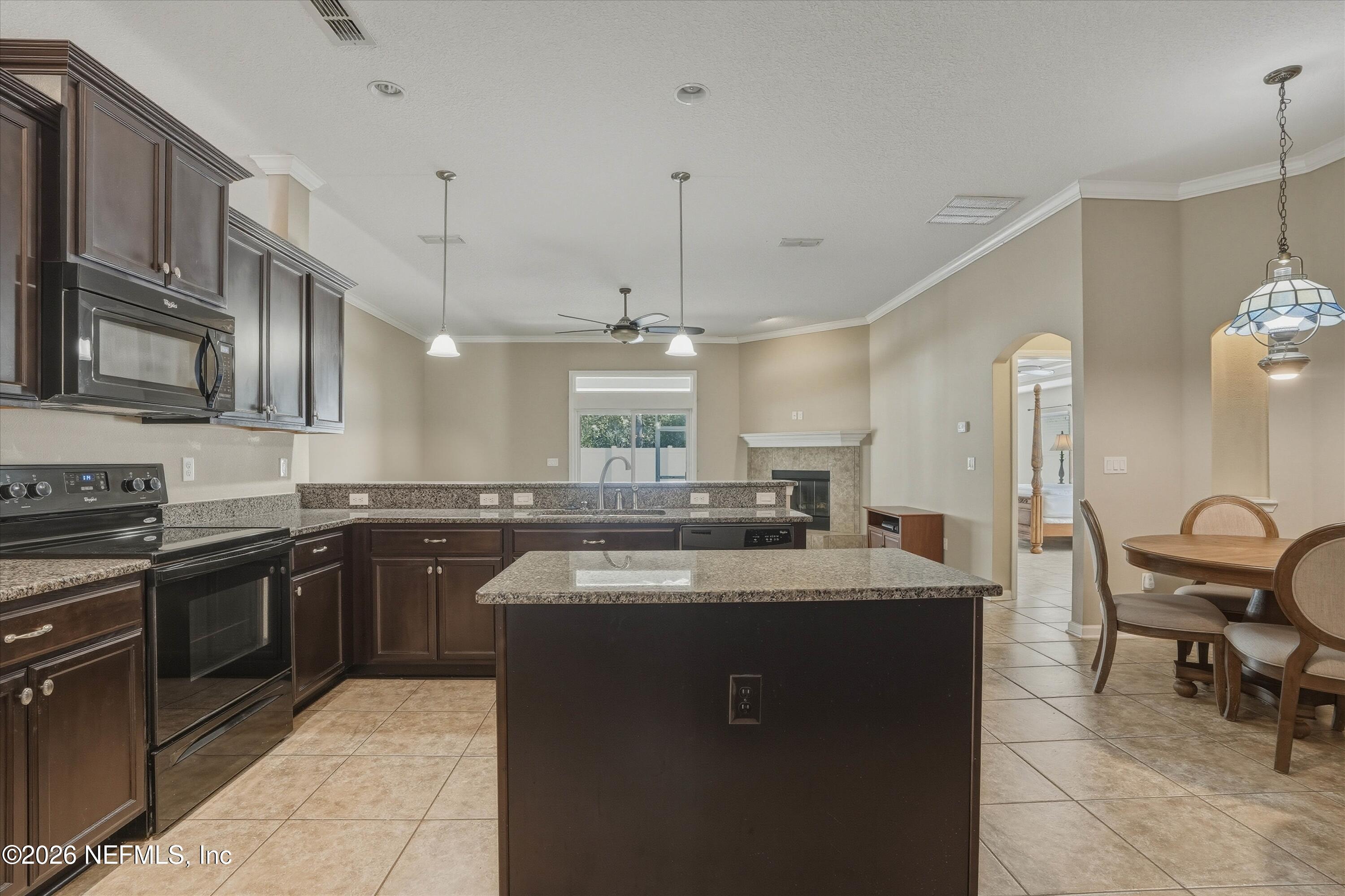 3908 Pipit Point Middleburg, FL 32068 - Photo 8 of 50 08-Kitchen