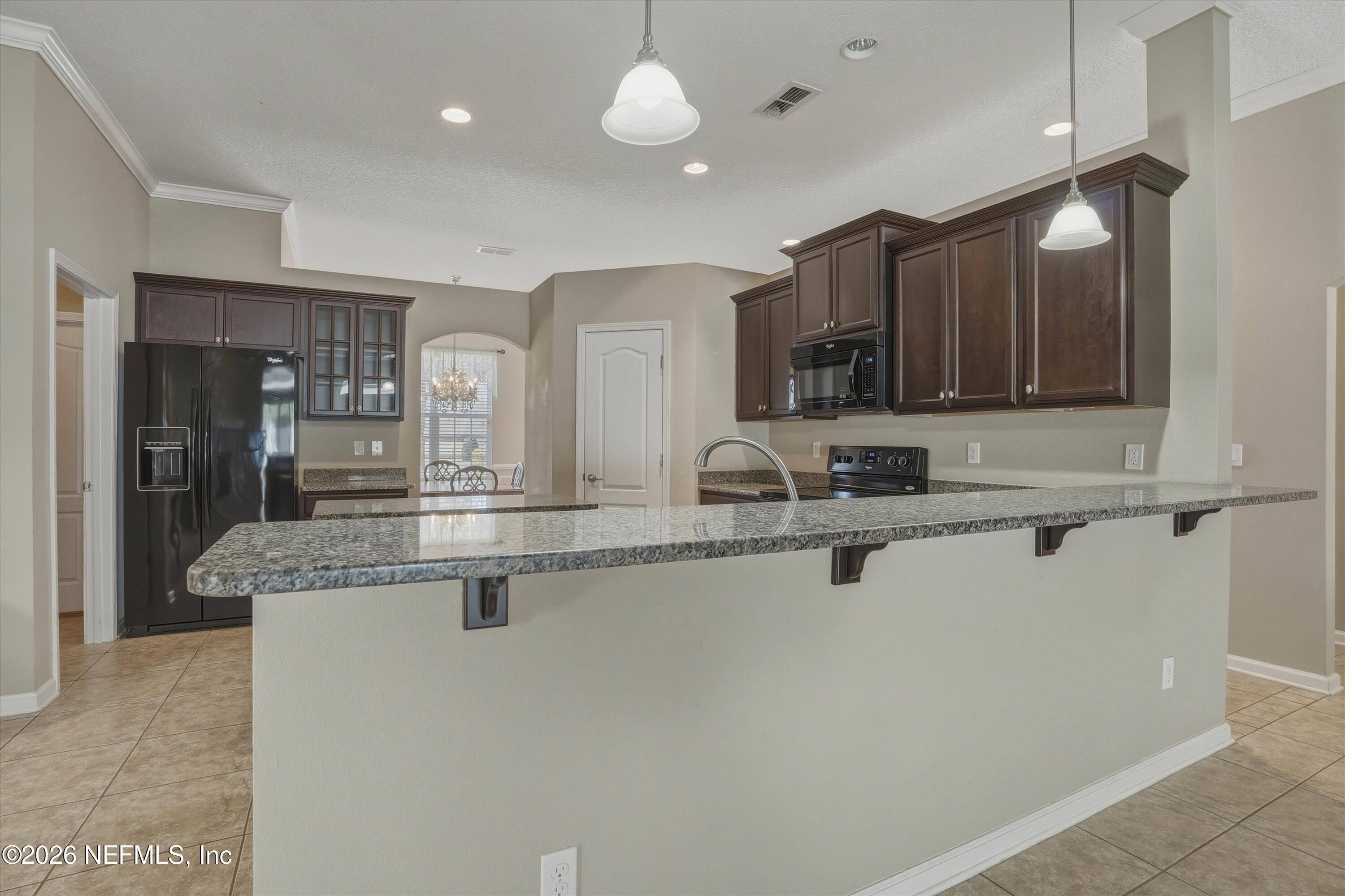 3908 Pipit Point Middleburg, FL 32068 - Photo 9 of 50 09-Kitchen