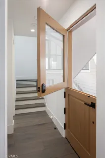 a bathroom with a bathtub and a window