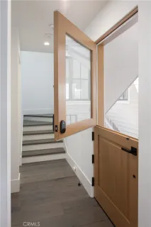 a bathroom with a bathtub and a window