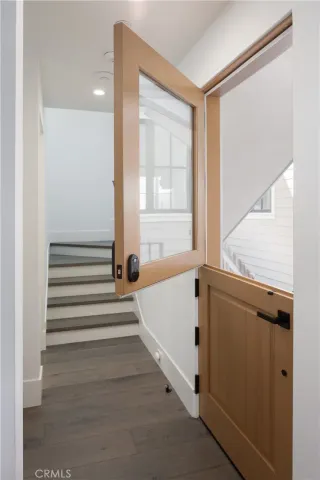 a bathroom with a bathtub and a window